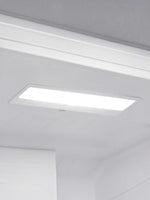 Éclairage intérieur à DEL lumineux dans le réfrigérateur MIDEA chez TOCO Meubles pour une visibilité optimale