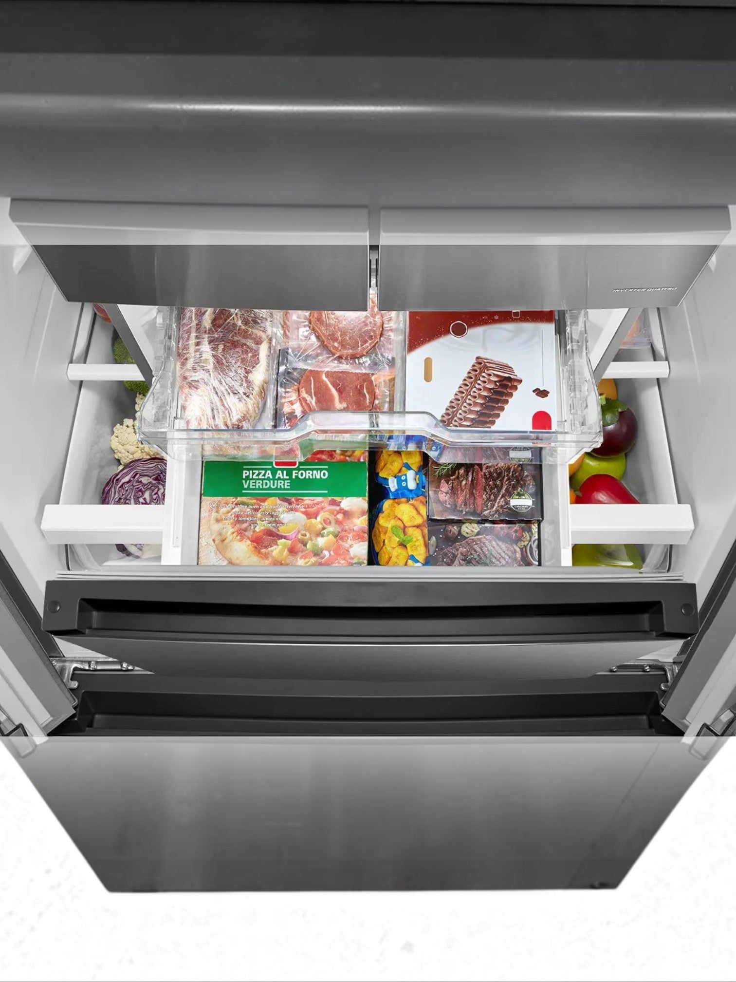 Vue plongeante sur l'intérieur du réfrigérateur MIDEA TOCO Meubles avec tiroirs de congélation et aliments organisés