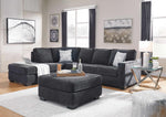 TOCO Meubles Sofa-lit sectionnel Marcel gris foncé en tissu, avec ottomans assortis et coussins décoratifs.