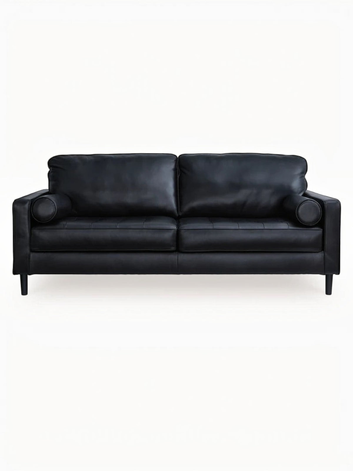 Sofa Bryce de TOCO Meubles en cuir noir avec coussins cylindriques et pieds fuselés