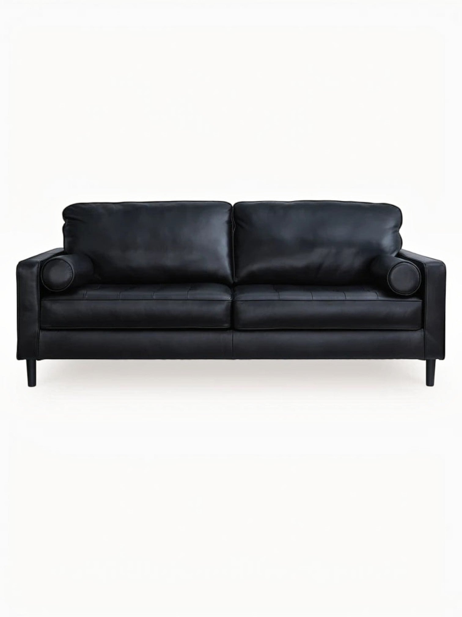Sofa Bryce de TOCO Meubles en cuir noir avec coussins cylindriques et pieds fuselés