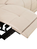 TOCO Meubles Sofa inclinable Charlie en cuir beige clair avec repose-pieds déployé et mécanisme visible.