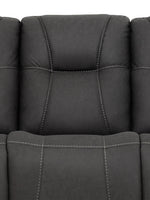 TOCO Meubles Sofa inclinable Elvis gris foncé avec surpiqûres contrastantes, assise confortable et dossier rembourré.