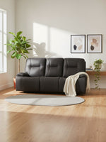 Sofa inclinable Elvis de TOCO Meubles en cuir gris foncé avec surpiqûres contrastantes dans un salon moderne