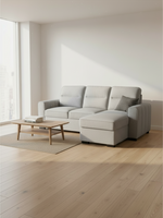 Sofa-lit convertible Amani par TOCO Meubles en tissu gris clair avec méridienne dans un salon lumineux et moderne