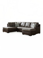 Sofa-lit d'angle Zuri par TOCO Meubles en aspect-cuir brun avec coussins décoratifs à motifs