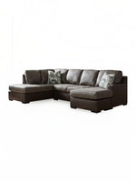 Sofa-lit d'angle Zuri par TOCO Meubles en aspect-cuir brun avec coussins décoratifs à motifs
