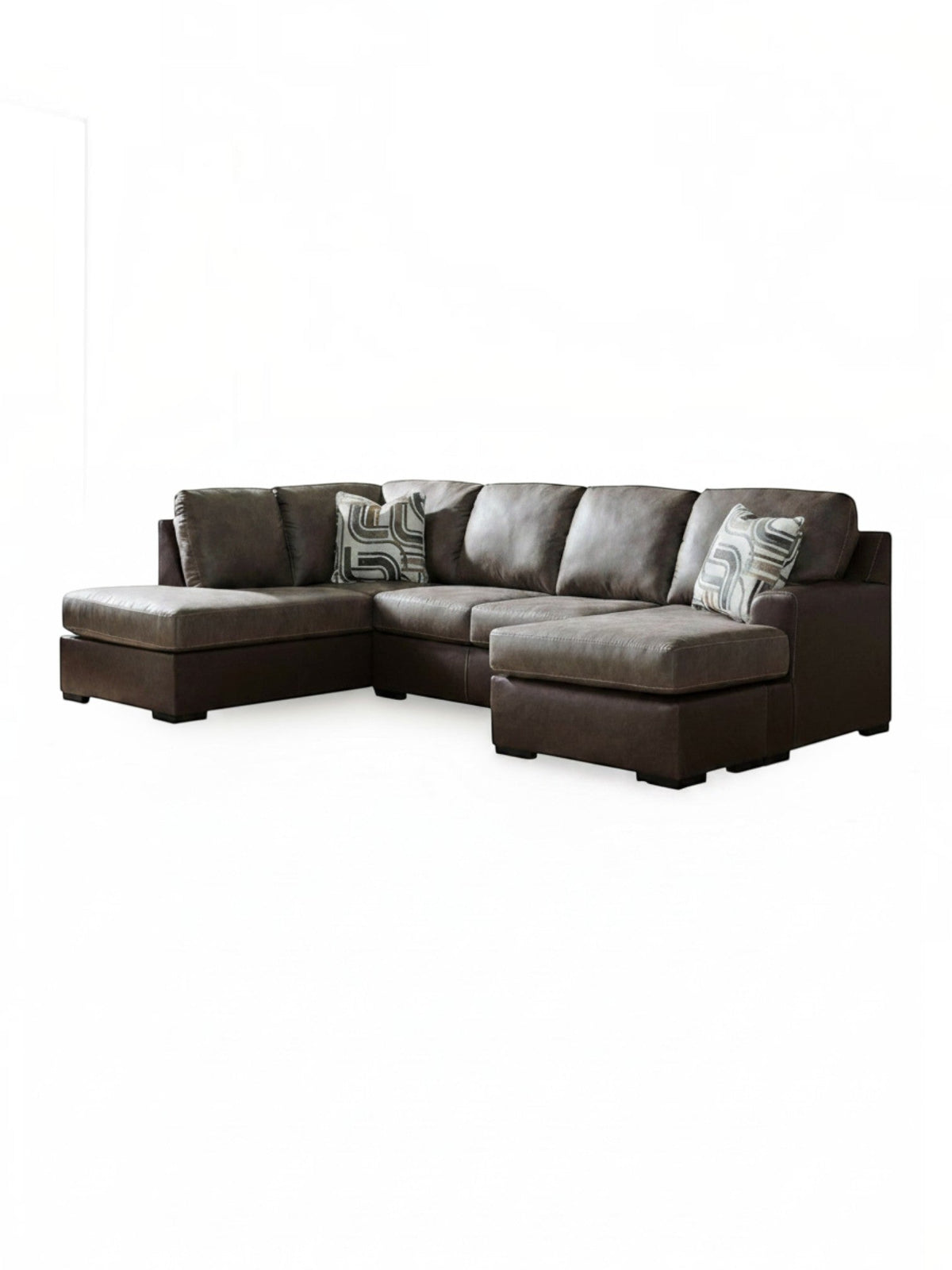 Sofa-lit d'angle Zuri par TOCO Meubles en aspect-cuir brun avec coussins décoratifs à motifs