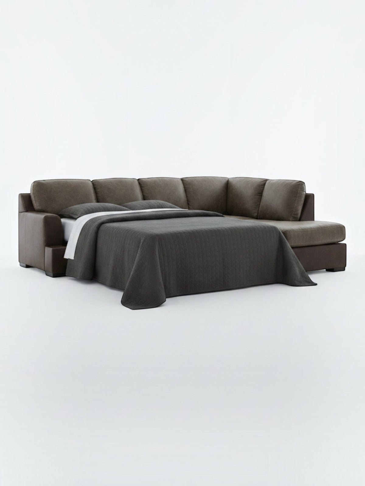 Sofa-lit d'angle Zuri TOCO Meubles en aspect cuir brun avec literie grise, design contemporain et confortable.