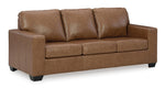 TOCO Meubles Sofa-lit Jelani en cuir brun clair, 3 places, design moderne avec coussins moelleux et pieds noirs.