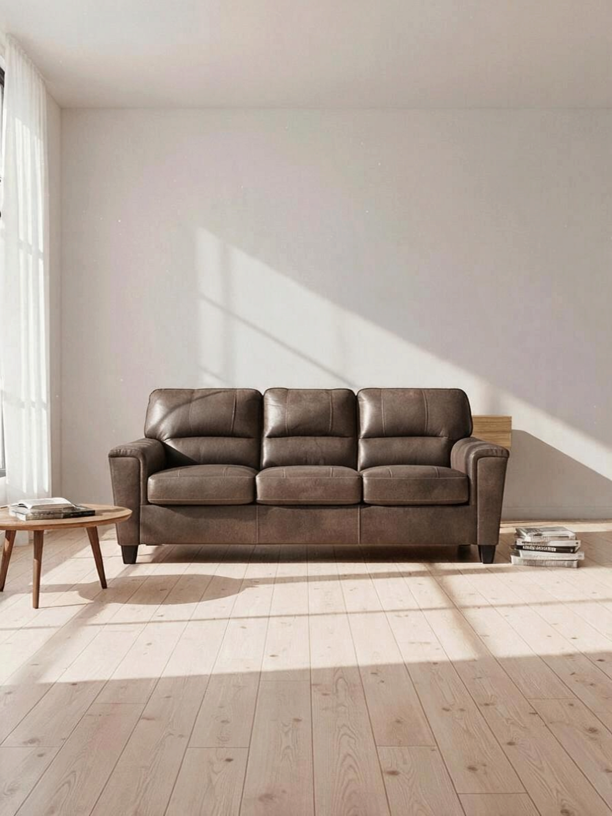 Sofa-lit convertible Kairo de TOCO Meubles en aspect cuir marron dans un salon lumineux au style scandinave