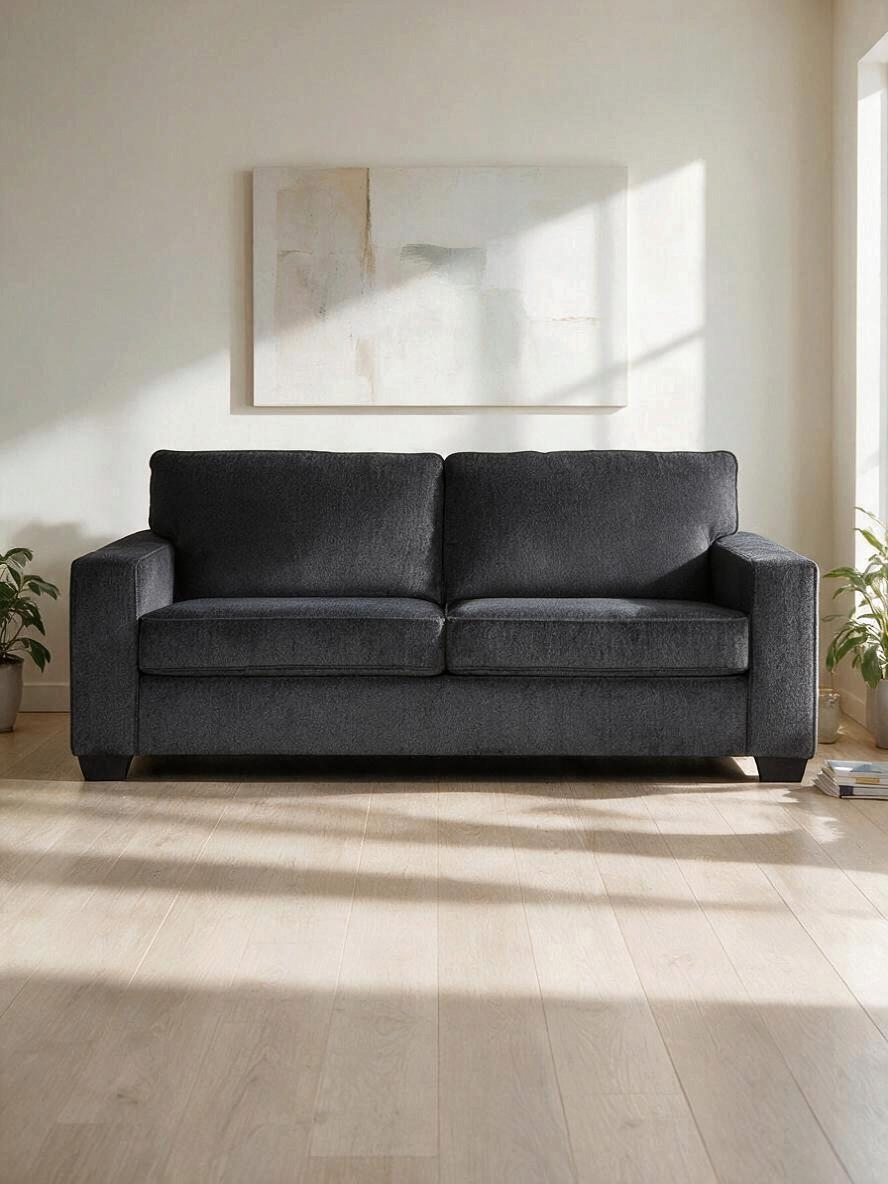 Sofa-lit Marcel gris foncé de TOCO Meubles au design contemporain dans un salon lumineux
