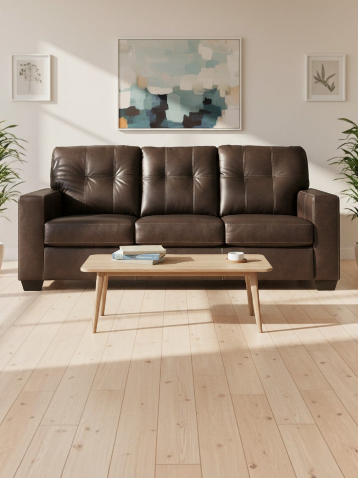 Sofa-lit Sacha TOCO Meubles en cuir marron avec assise capitonnée dans un salon lumineux et moderne