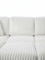 Sofa-lit sectionnel Célio blanc en velours côtelé texturé de TOCO Meubles
