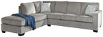 TOCO Meubles Sofa-lit sectionnel Marcel gris en tissu avec coussins décoratifs et jeté bleu.