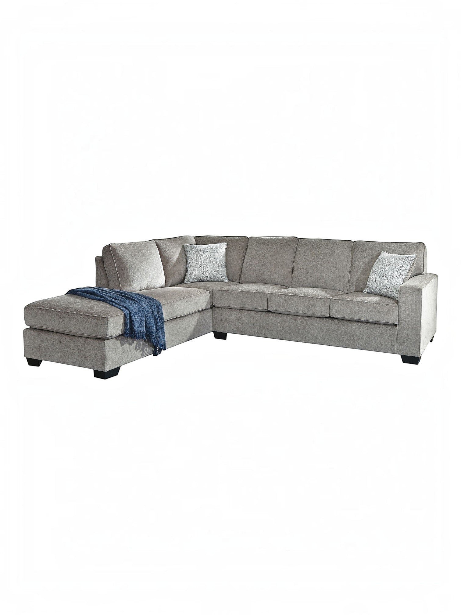 TOCO Meubles Sofa-lit sectionnel Marcel gris en tissu avec coussins décoratifs et jeté bleu.