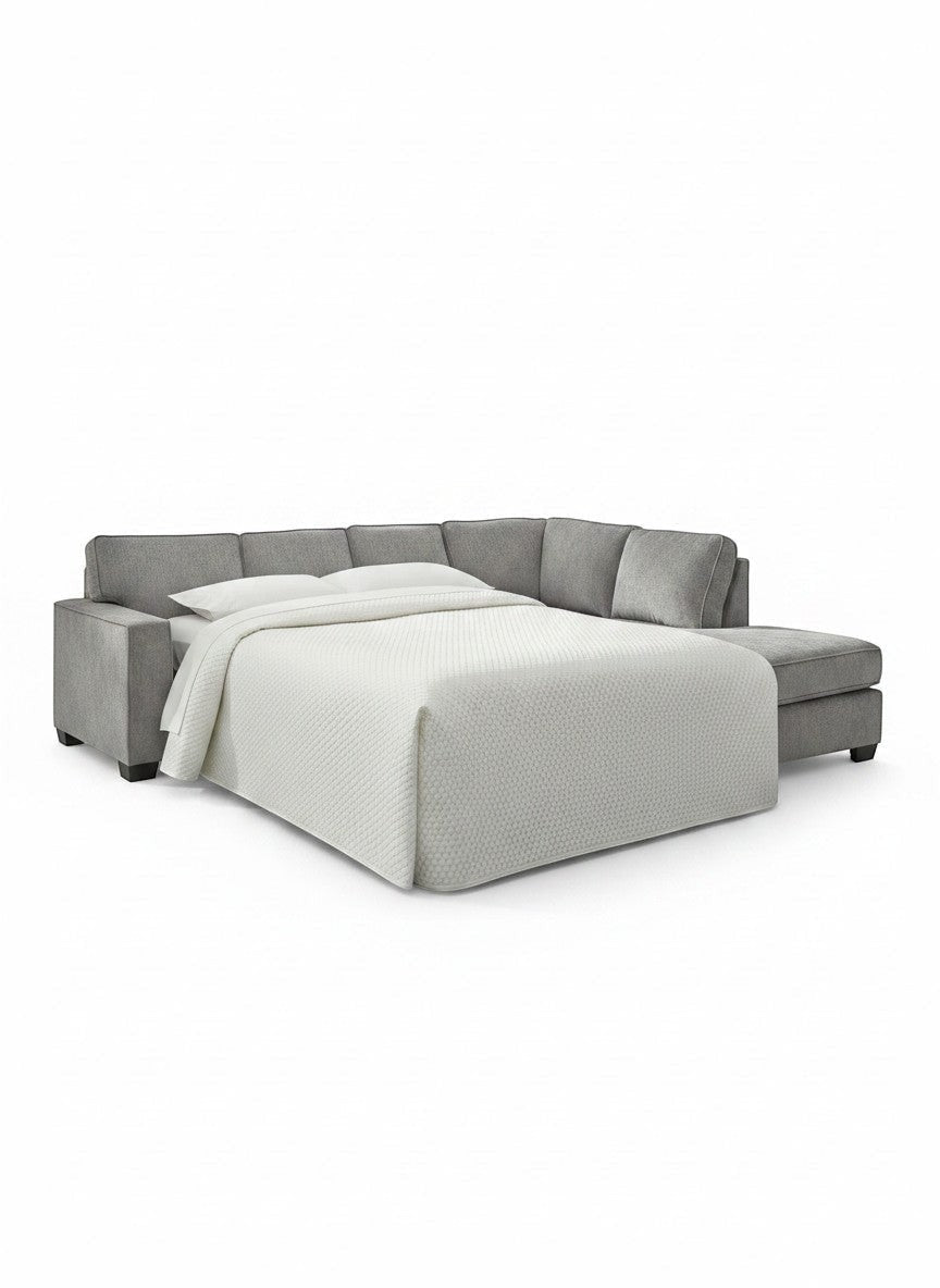Sofa-lit sectionnel Marcel gris en tissu de TOCO Meubles avec lit déplié et couverture blanche