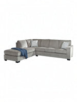 TOCO Meubles Sofa-lit sectionnel Marcel gris en tissu avec coussins décoratifs et jeté bleu.