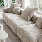 Sofa modulaire Nola de TOCO Meubles en velours côtelé beige avec trois sections et coussins assortis
