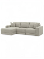 Sofa modulaire Soris de TOCO Meubles en tissu beige avec méridienne et coussins décoratifs
