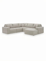 Sofa modulaire Soris de TOCO Meubles en tissu beige avec méridienne et coussins décoratifs