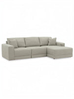 Sofa modulaire Soris de TOCO Meubles en tissu beige avec méridienne et coussins décoratifs