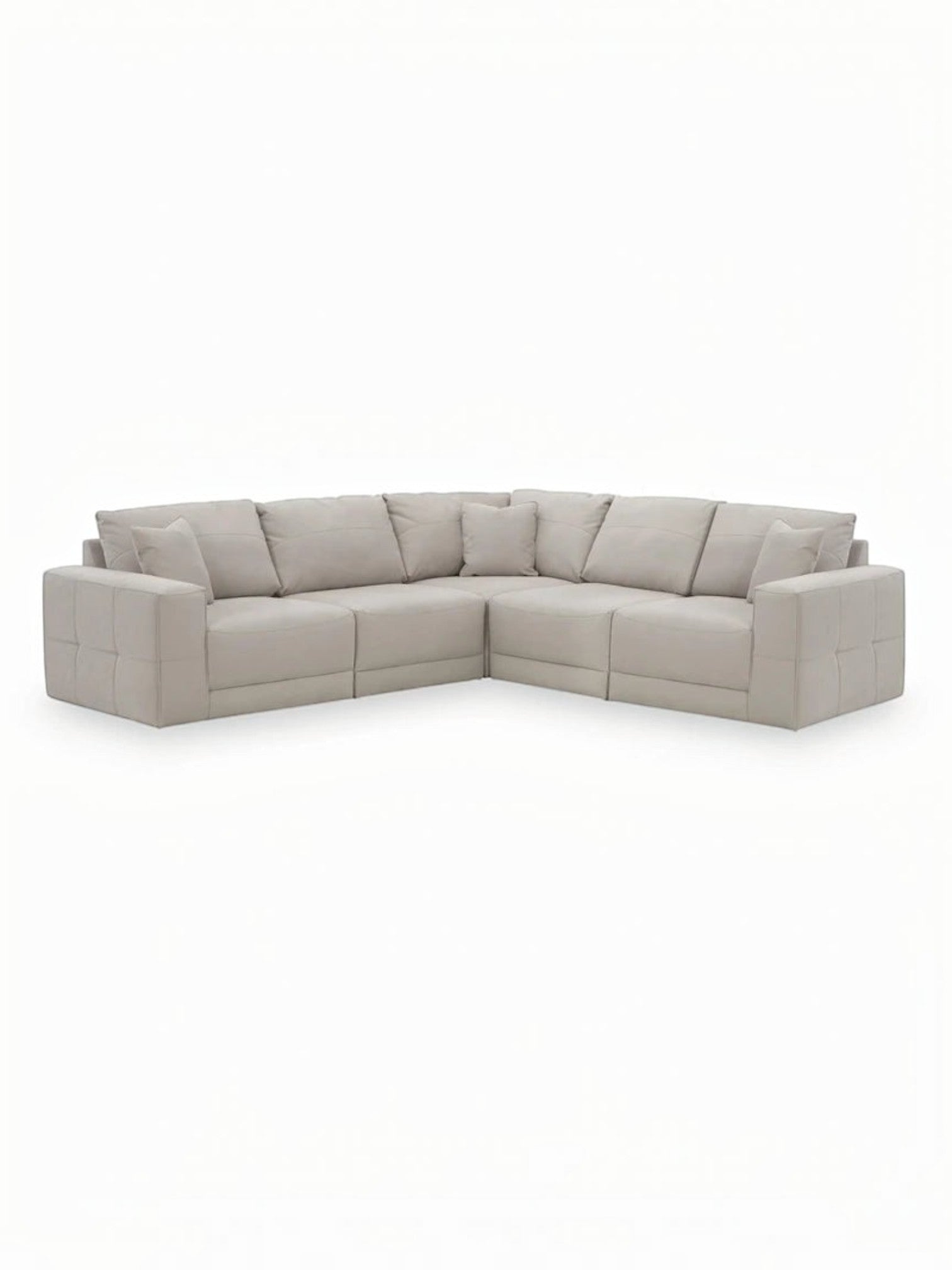 Sofa modulaire d'angle TOCO Meubles Soris en tissu beige clair avec design contemporain et coussins assortis