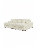 Sofa modulaire Manoa de TOCO Meubles en tissu côtelé blanc crème avec coussins assortis et pieds en bois foncé