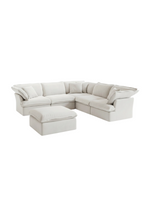 Sofa modulaire blanc TOCO Meubles 5 morceaux avec ottoman assorti et coussins décoratifs sur fond blanc