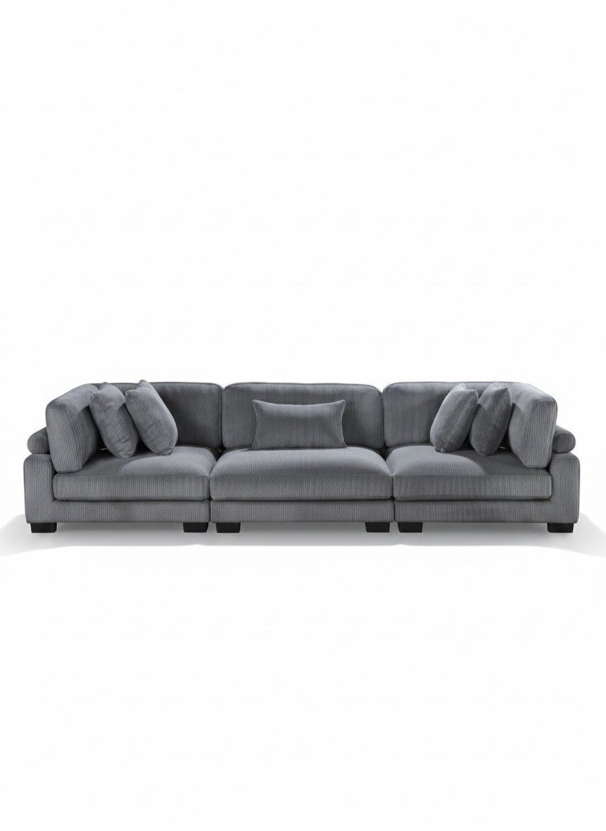 Sofa modulaire gris TOCO Meubles en velours côtelé avec coussins, design contemporain et confortable.
