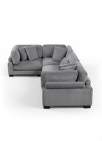 Sofa modulaire d'angle gris en velours côtelé de TOCO Meubles avec coussins moelleux et design contemporain