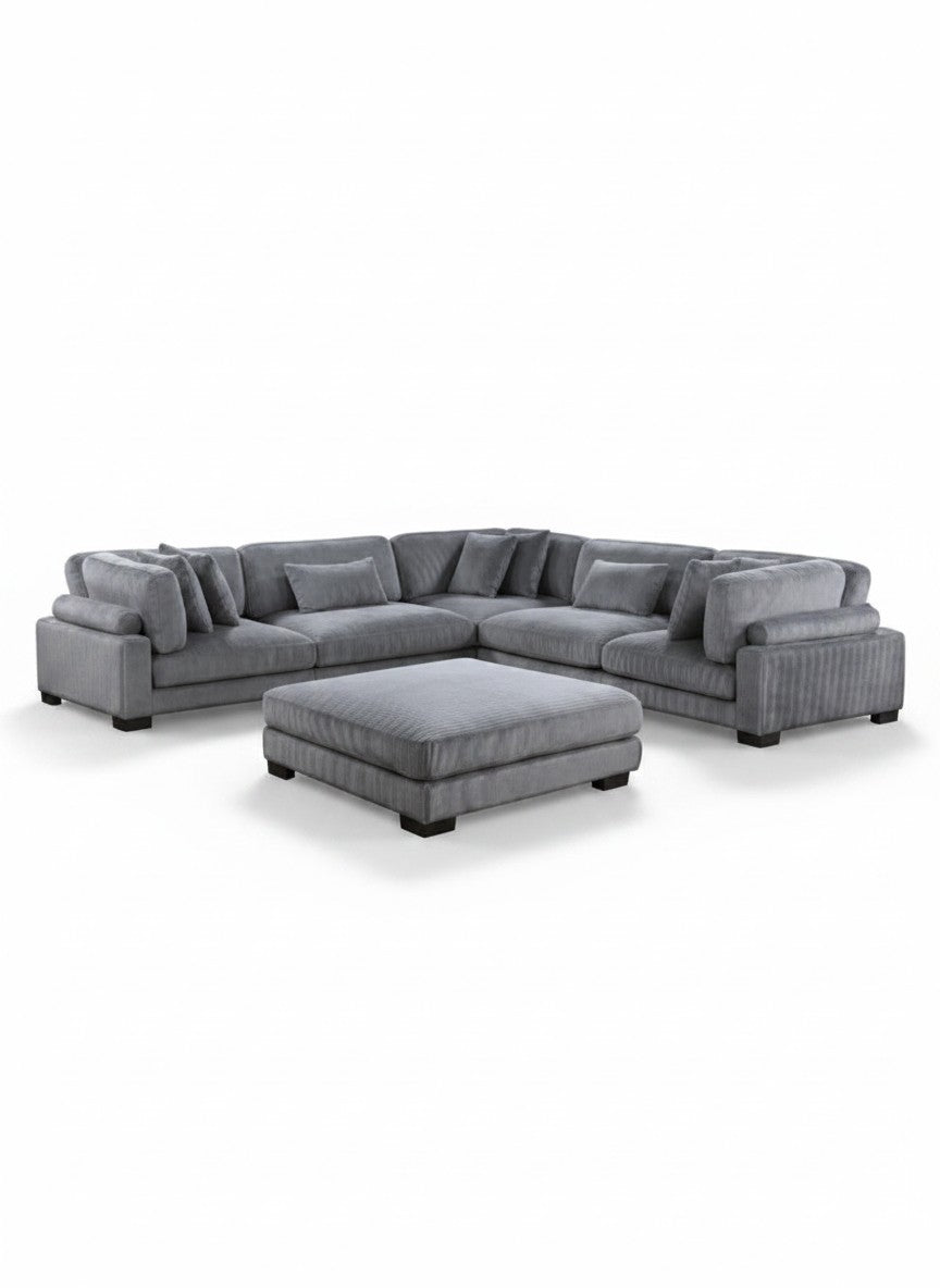 Sofa modulaire gris TOCO Meubles en velours côtelé avec pouf assorti et assises profondes pour un salon confortable