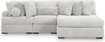 TOCO Meubles Sofa Modulaire Nuage gris clair en tissu texturé avec coussins assortis et un coussin rond.