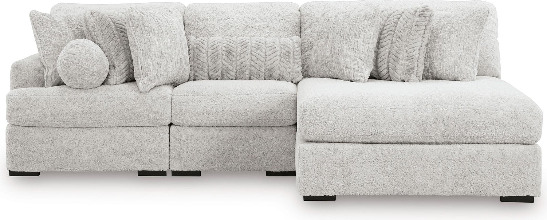 TOCO Meubles Sofa Modulaire Nuage gris clair en tissu texturé avec coussins assortis et un coussin rond.