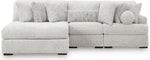 TOCO Meubles Sofa modulaire Nuage gris clair en tissu texturé, avec chaise longue et coussins assortis.