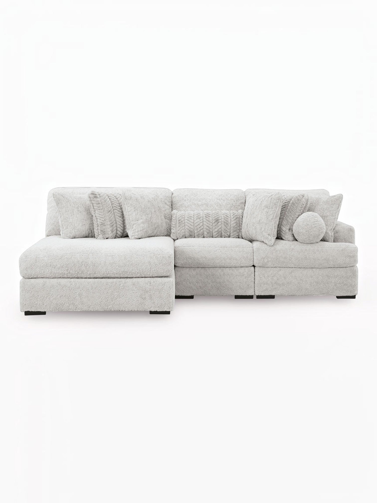 TOCO Meubles Sofa modulaire Nuage gris clair en tissu texturé, avec chaise longue et coussins assortis.