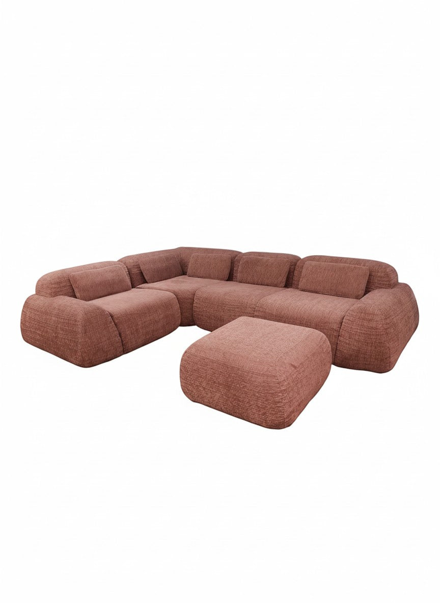 Sofa modulaire TOCO Meubles Mia rose en tissu texturé avec pouf assorti dans un style contemporain