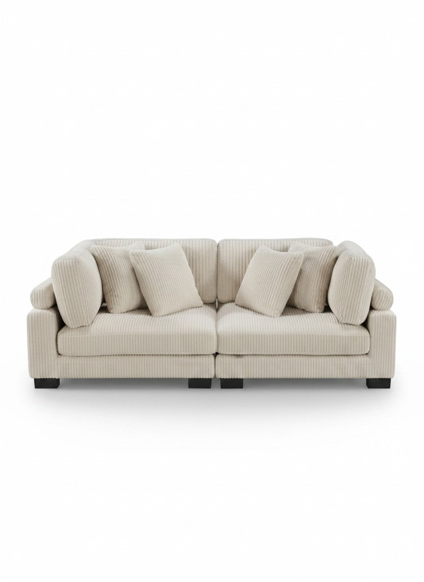 Sofa modulaire Traverse TOCO Meubles en velours côtelé beige avec coussins assortis, vue de face