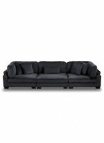 Sofa modulaire Traverse TOCO Meubles en velours côtelé noir avec coussins décoratifs, vue de face