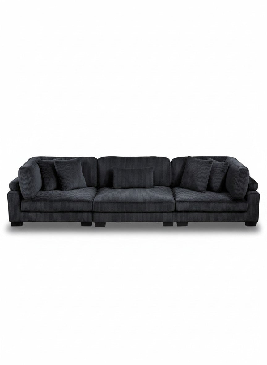 Sofa modulaire Traverse TOCO Meubles en velours côtelé noir avec coussins décoratifs, vue de face