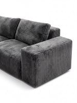 Sofa sectionnel Alpaga gris en velours côtelé texturé, design moderne et personnalisable par TOCO Meubles.
