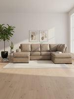 Sofa sectionnel beige TOCO Meubles en cuir avec méridienne dans un salon moderne et lumineux