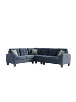 Sofa sectionnel bleu TOCO Meubles 4 pieces avec coussins decoratifs a motifs et dossier capitonne