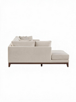 Sofa sectionnel Calvi de TOCO Meubles en tissu chenille beige avec structure en bois brun foncé, vue latérale