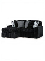Sofa sectionnel modulaire Corda de TOCO Meubles en velours côtelé noir avec coussins décoratifs texturés