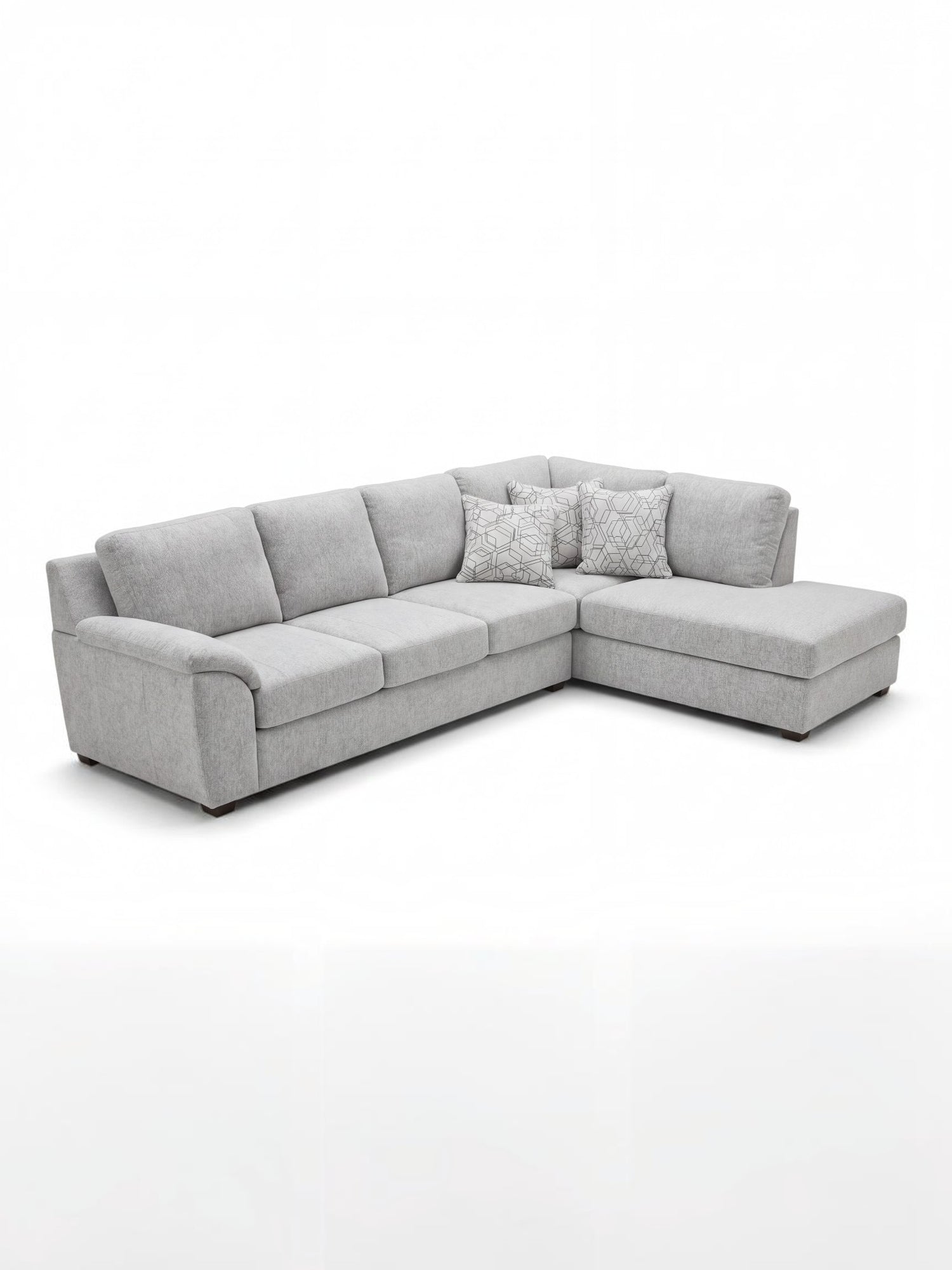 Sofa sectionnel gris TOCO Meubles avec méridienne et coussins décoratifs à motifs géométriques, design moderne.