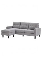 Sofa sectionnel réversible Malo gris par TOCO Meubles avec coussins capitonnés et pieds noirs
