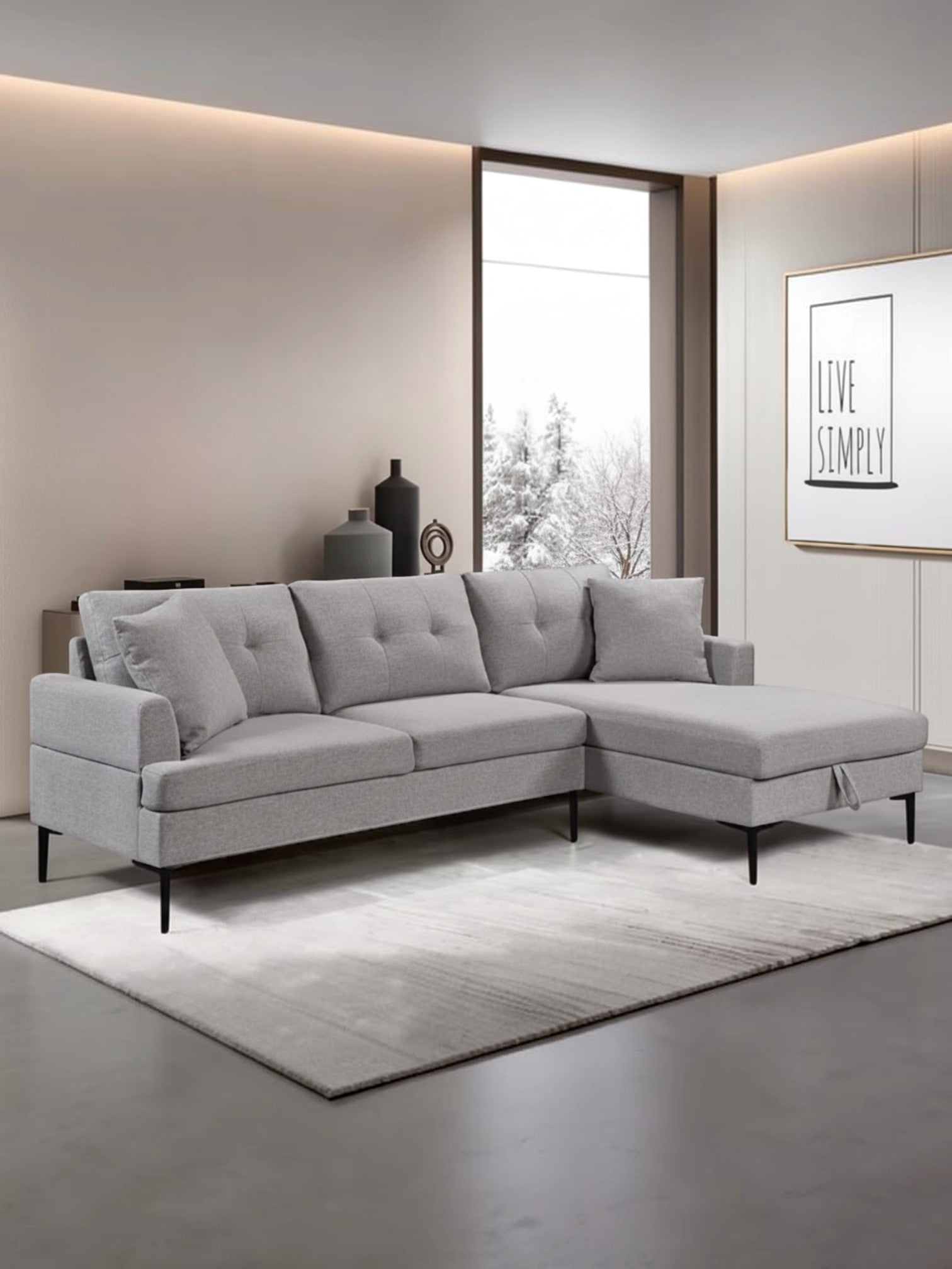 Sofa sectionnel Éden gris de TOCO Meubles avec méridienne et pieds en métal noir dans un salon moderne