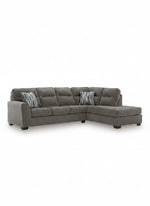 Sofa sectionnel Brutus de TOCO Meubles en tissu gris avec méridienne et coussins décoratifs à motifs