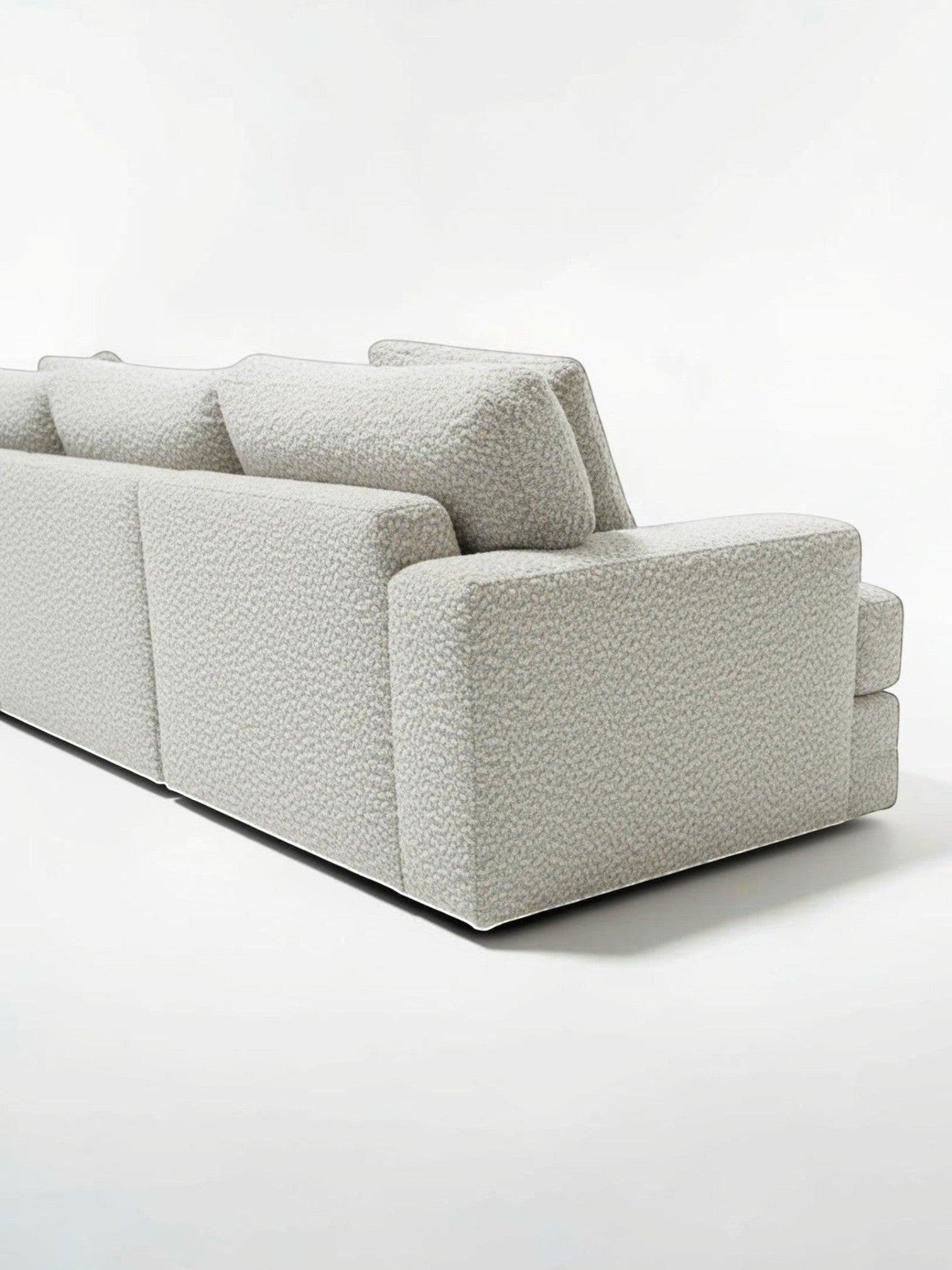 Sofa sectionnel personnalisable Melissa de TOCO Meubles en tissu bouclé gris clair texturé au design moderne